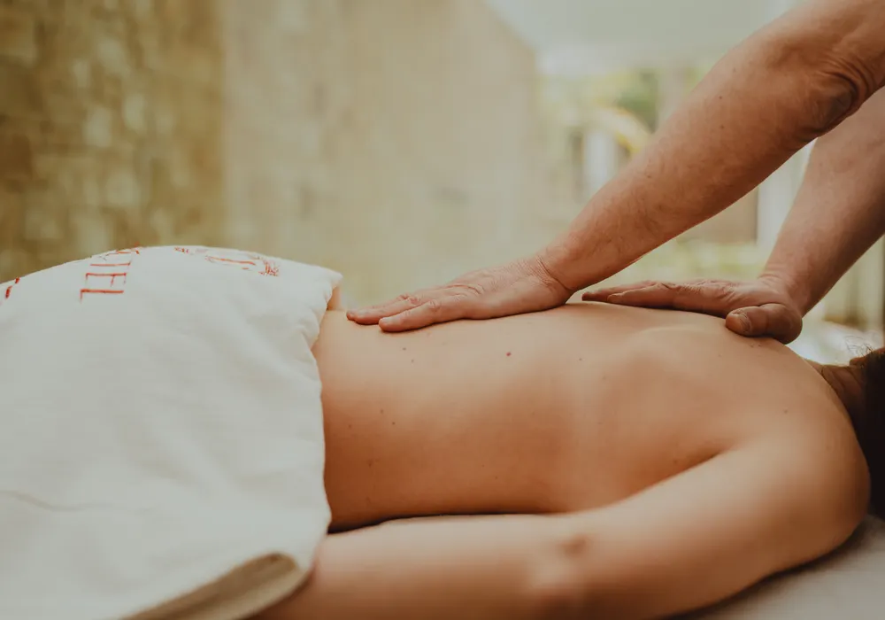 Relaxing massage procedure in a wellness center